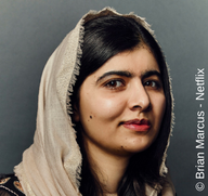 Malala signs We Are Displaced with W&N
