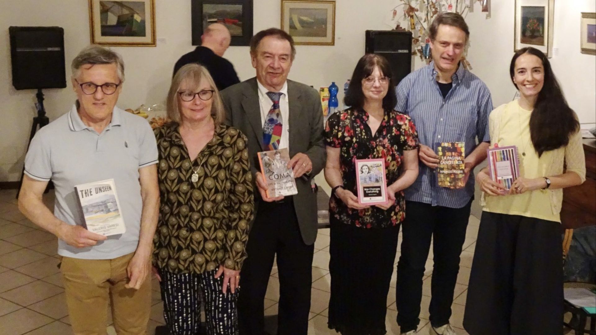 Patricia Borlenghi (second left) with five of her authors at an event in Italy in May 2022