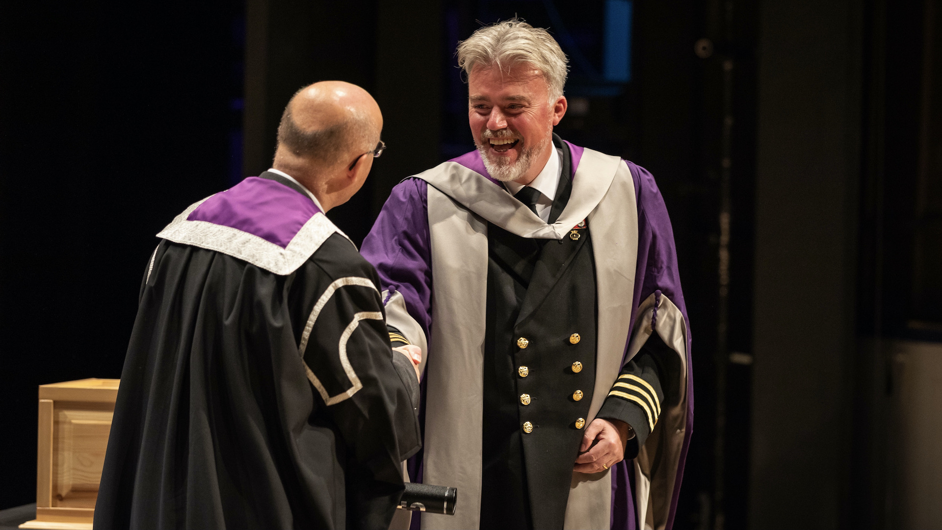 Iain Macneil receiving his honorary doctorate