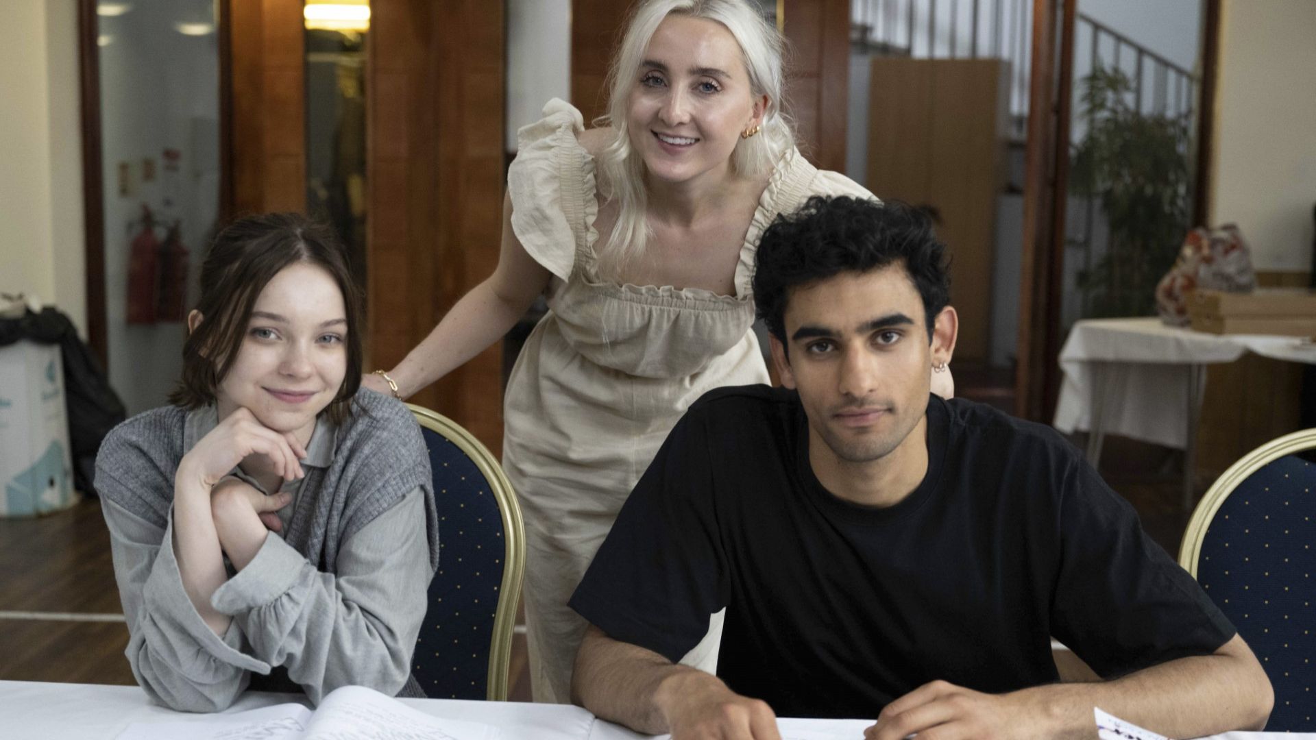 Left to right: Emma Myers, Holly Jackson and Zain Iqbal © Sally Mais, BBC/Moonage