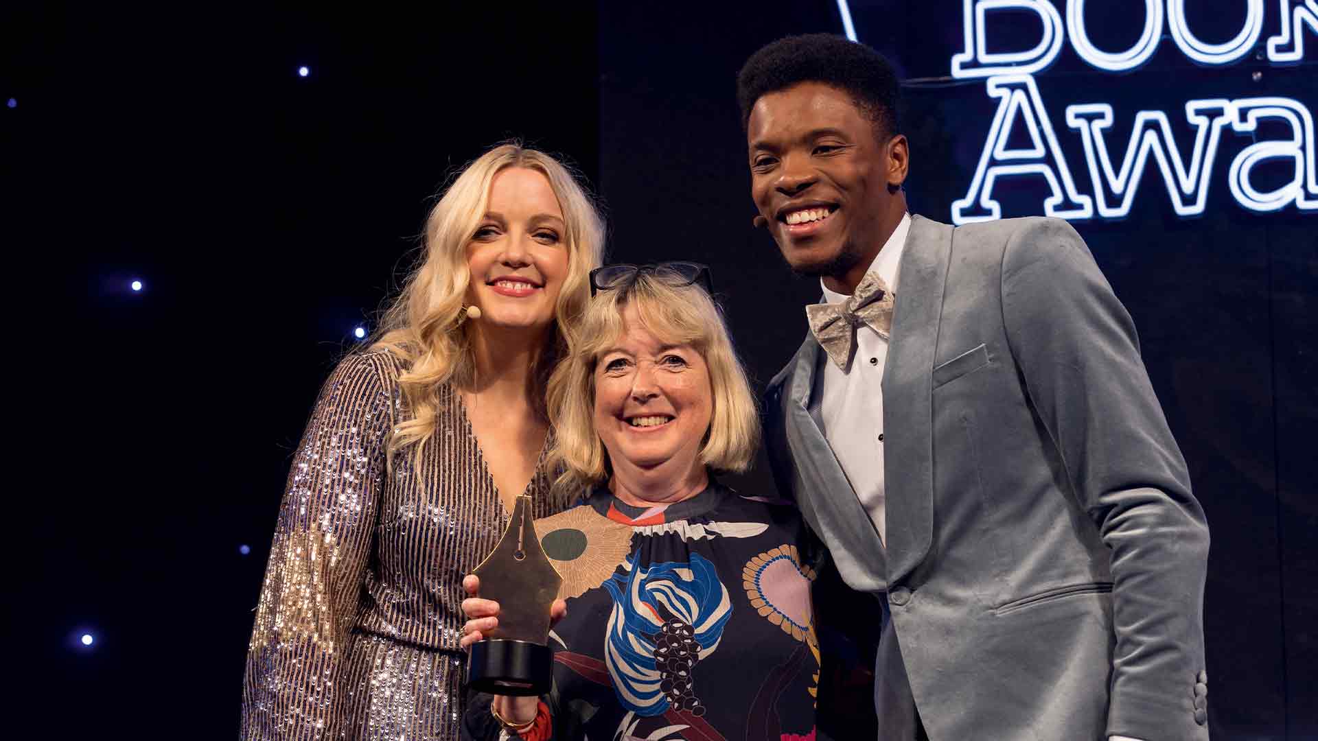 Amanda Ridout (centre) with Lauren Laverne and Rhys Stephenson at The British Book Awards in 2023