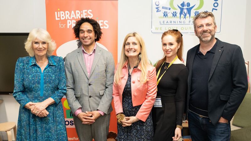 Queen Camilla joins Cressida Cowell and Joseph Coelho to celebrate 50th Coronation primary school library