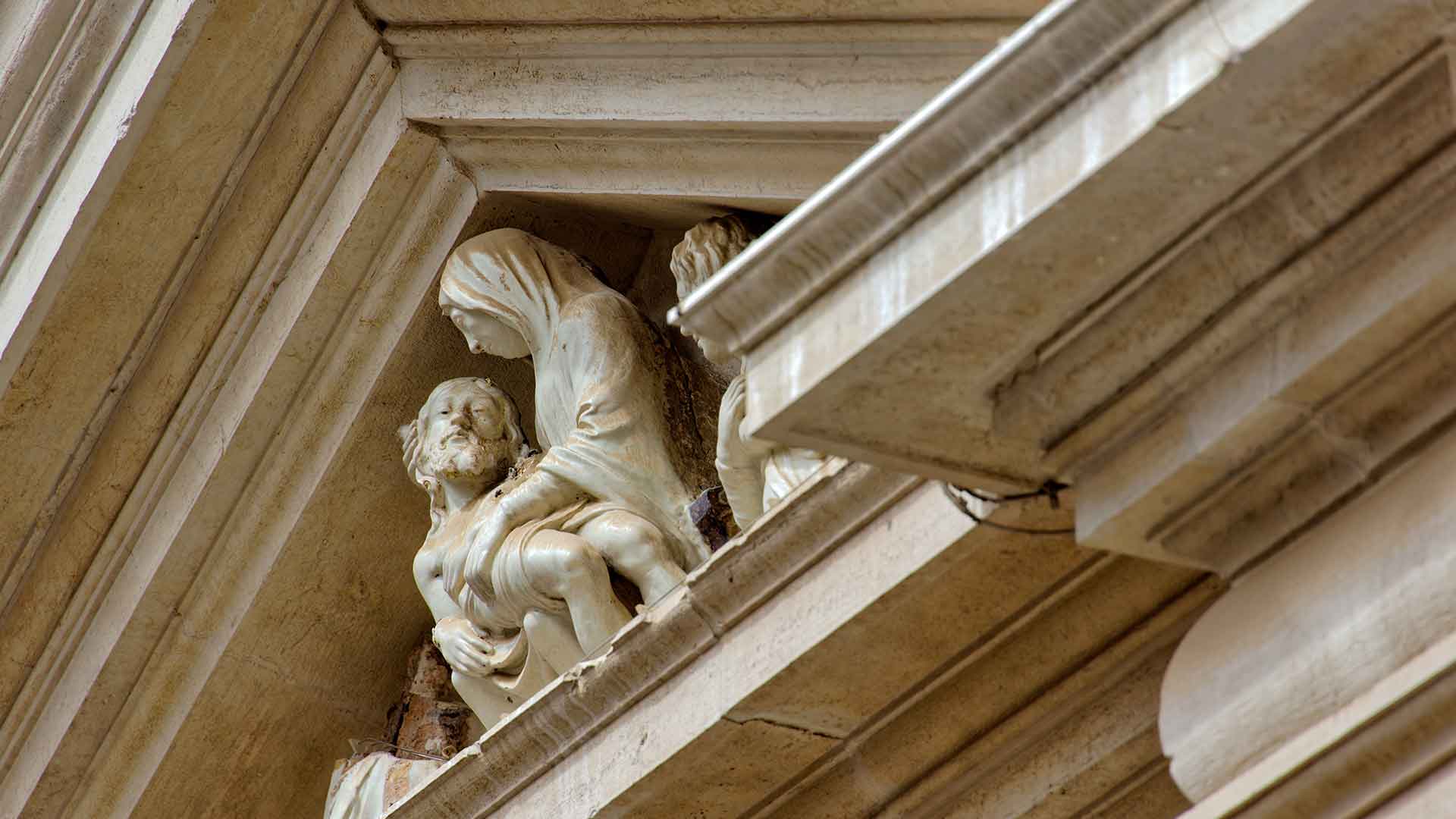 Sculpture atop a Venetian church. &copy; Shutterstock