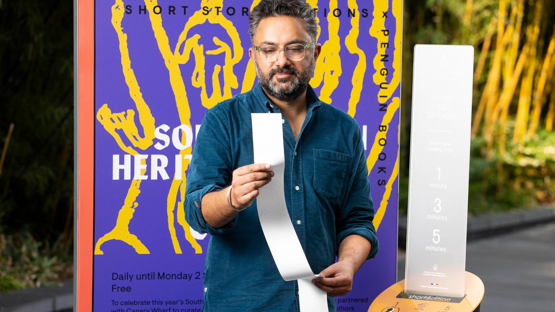 Sathnam Sanghera at a short story station in London's Canary Wharf