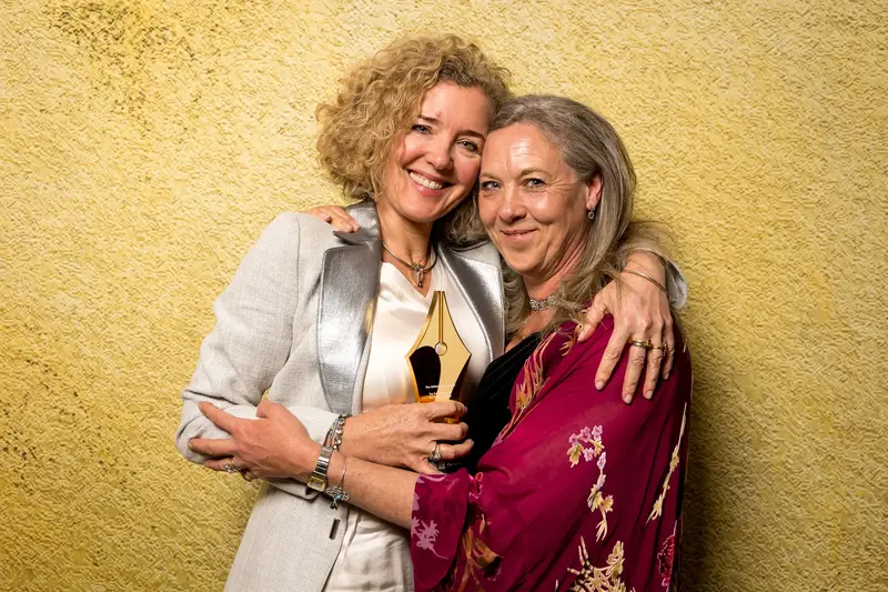 Antonia Potter Prentice & Louise Ansdell receiving The British Book Award for Excellence in Romantic Fiction on behalf of Joanna Trollope &copy; David Monteith Hodge