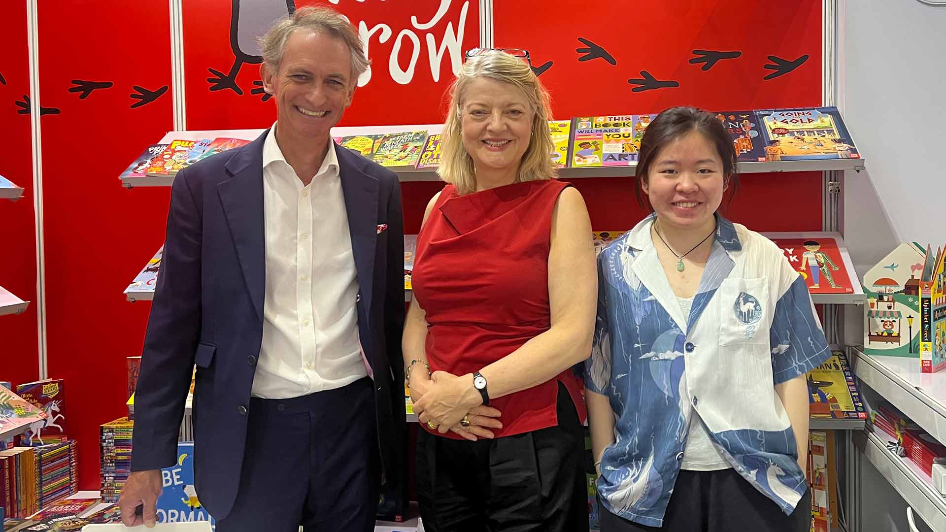 Kate Wilson, centre, with Nosy Crow’s senior export manager Damon Greeney (left) and rights assistant Jing Yu Chew at BIBF 2024